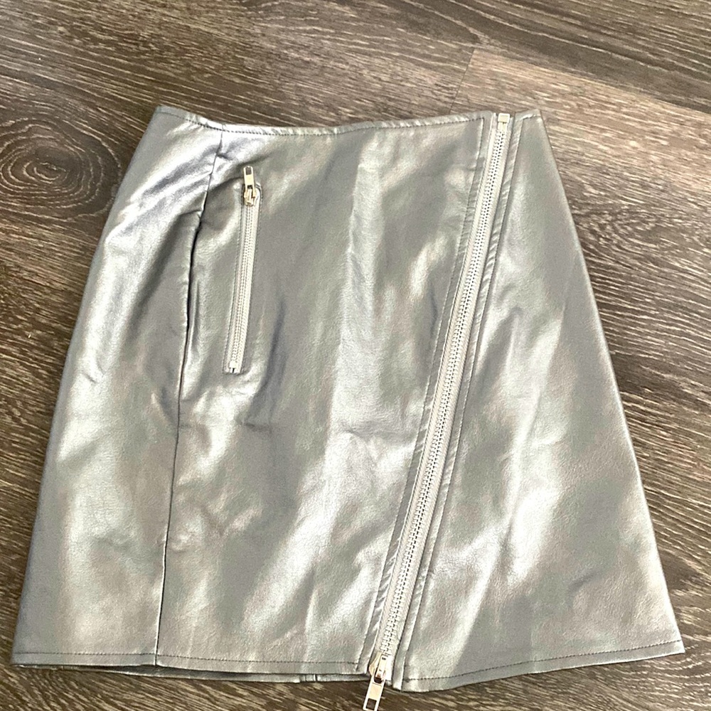 Silver chrome miniskirt with zip-front closure.